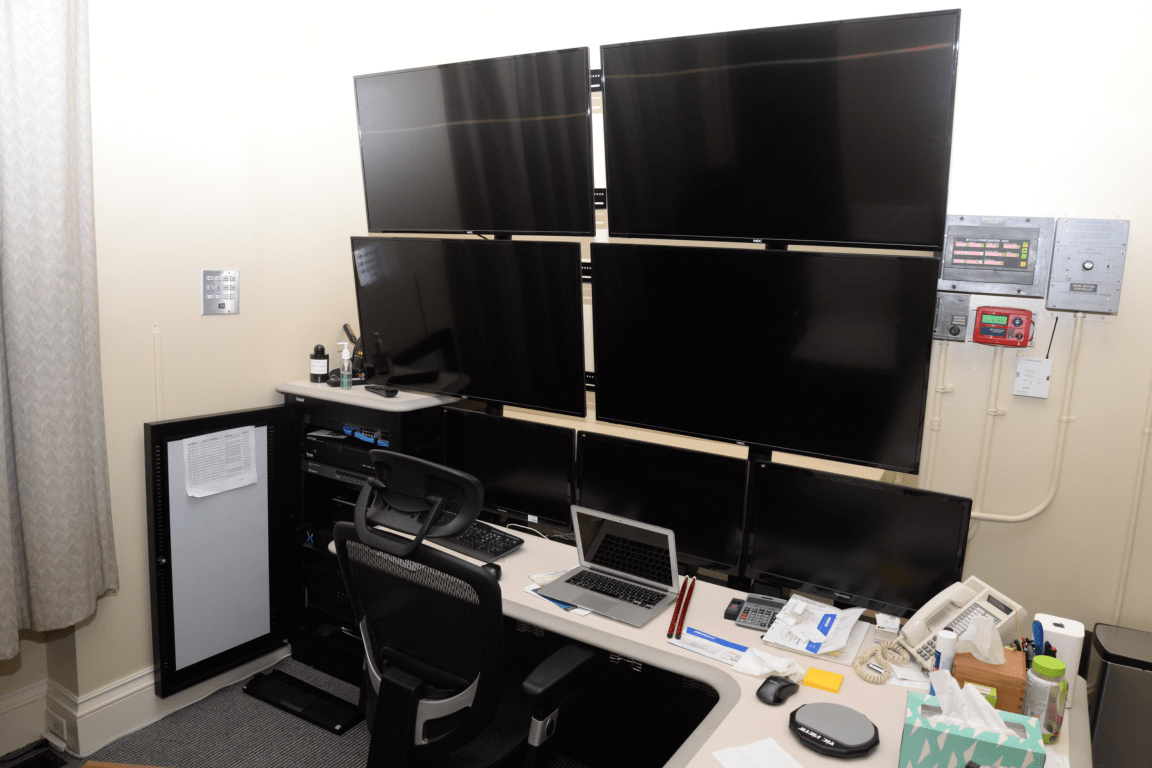 A control room with multiple monitors