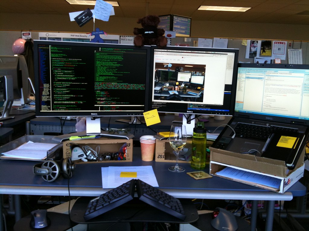A developer's desk and screen